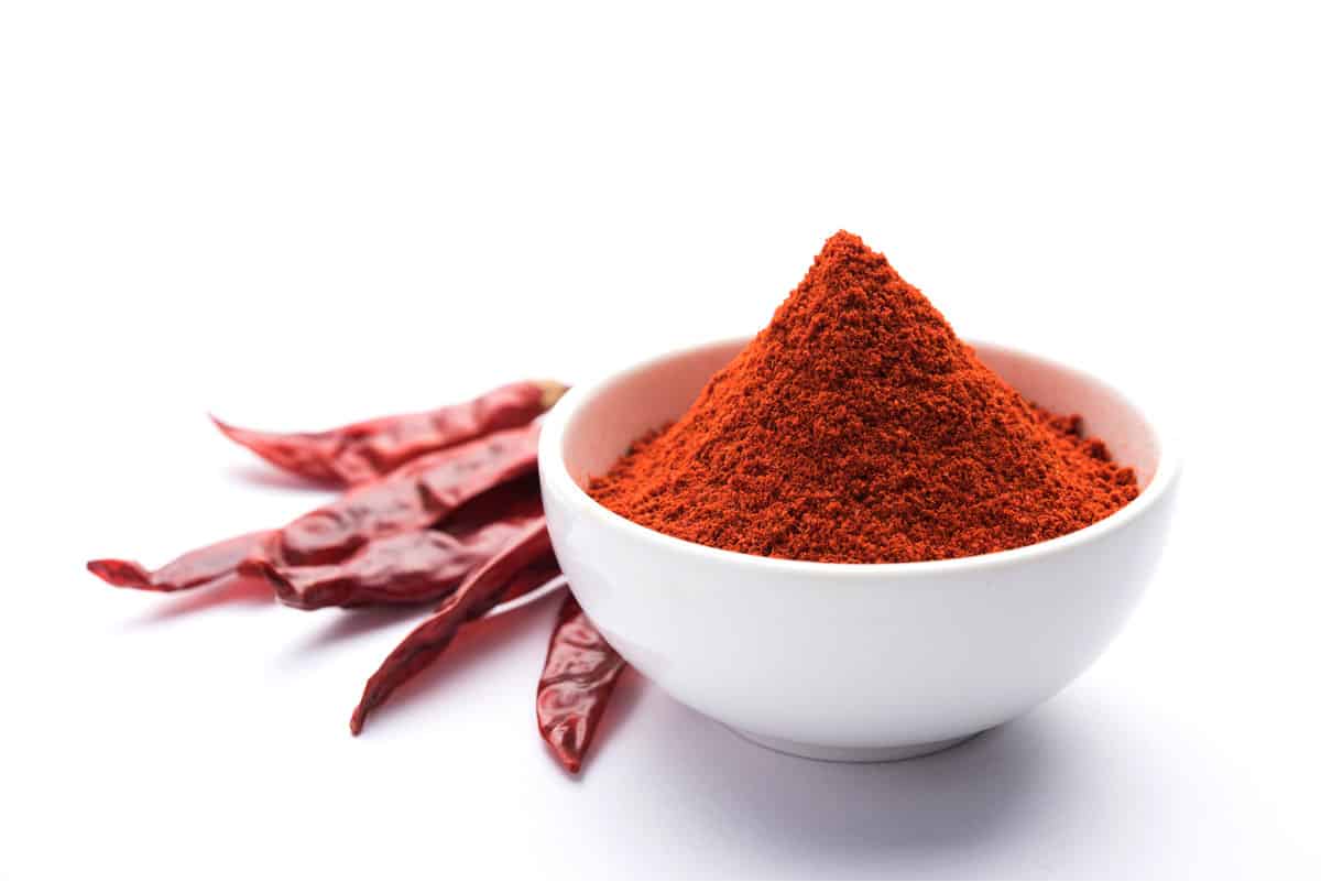 A bowl of paprika powder to be used as a substitute for red pepper flakes