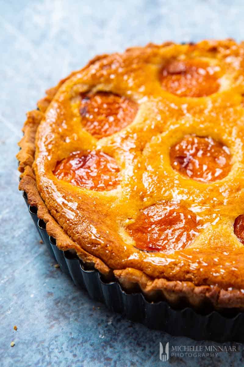 A baked golden crust apricot tart