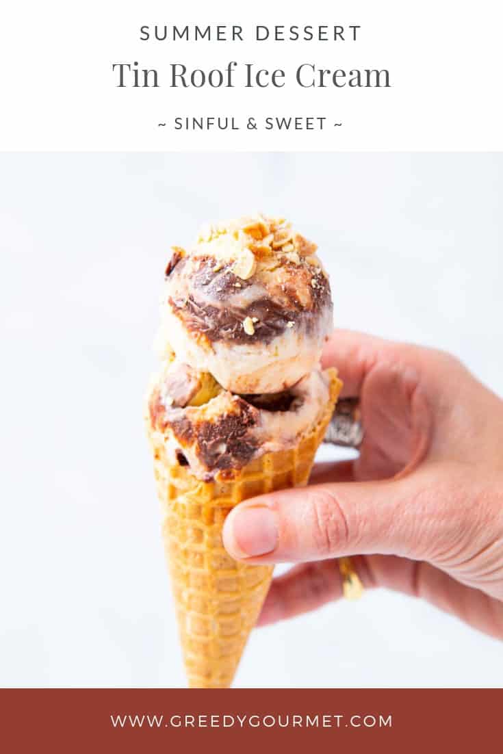 Two scoops of tin roof ice cream on a sugar cone