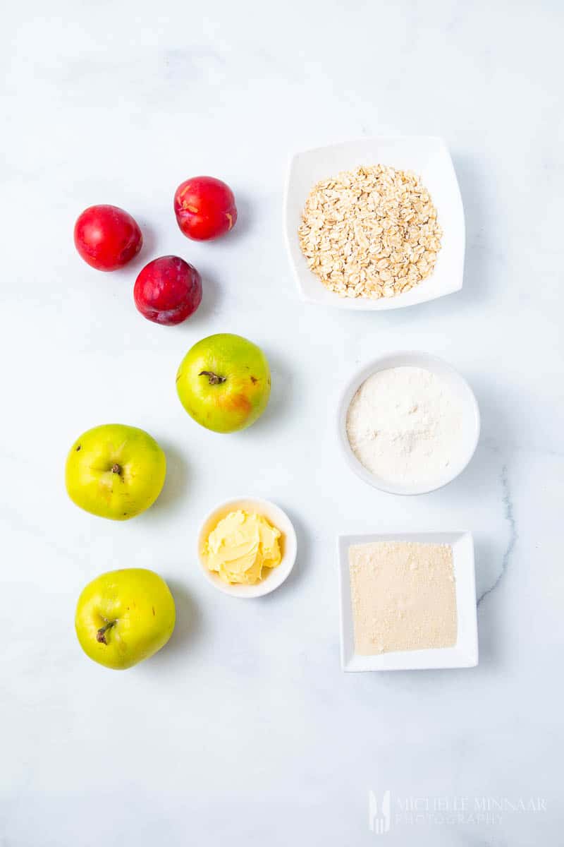 Ingredients to make apple and plum crumble