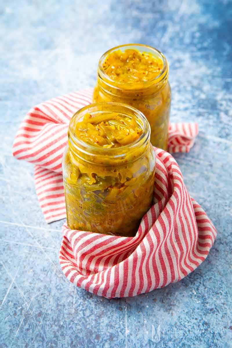 Two jars of yellow runner bean chutney