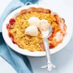 Crumble served with ice cream.