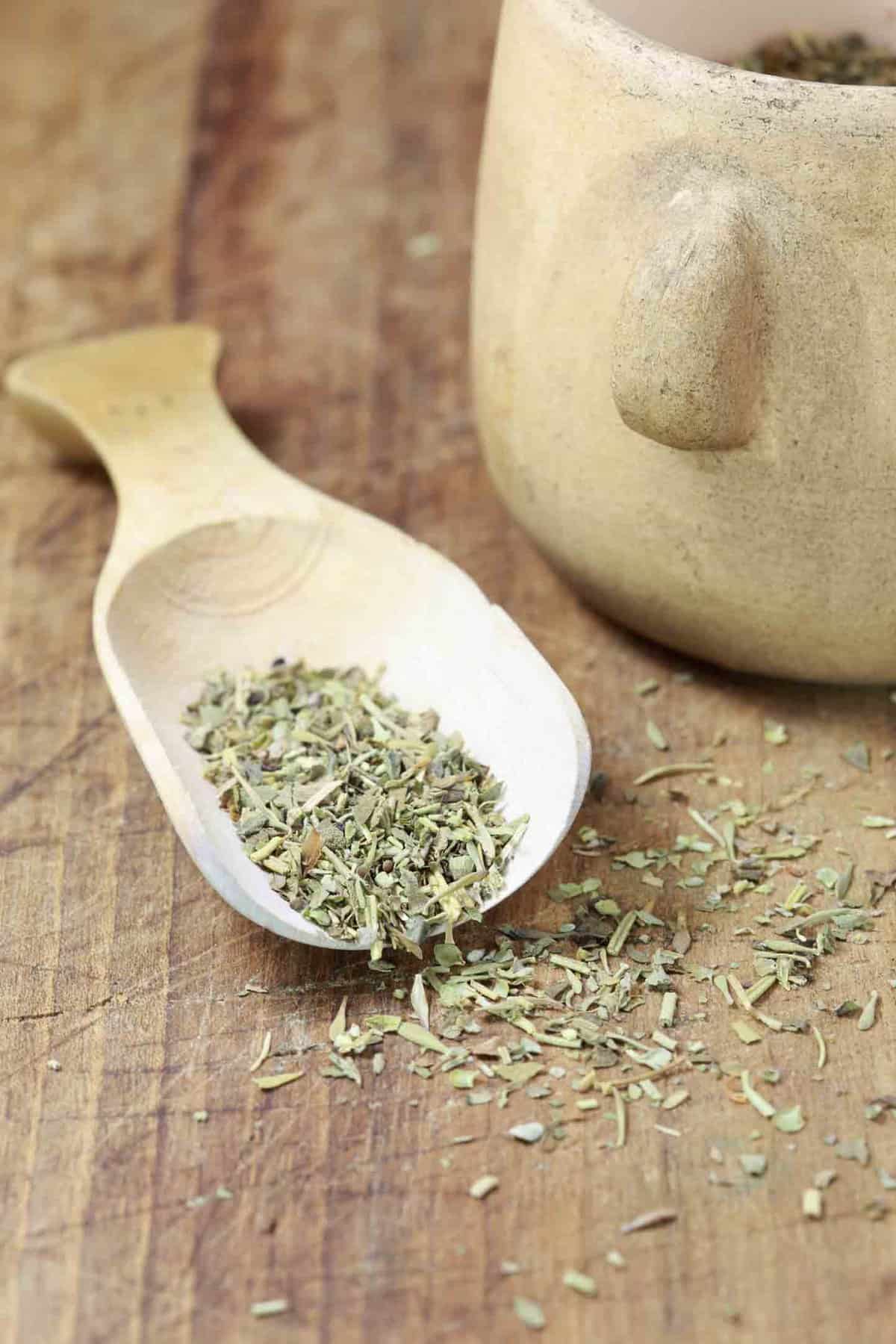 Wooden spoon and herbs de provence.