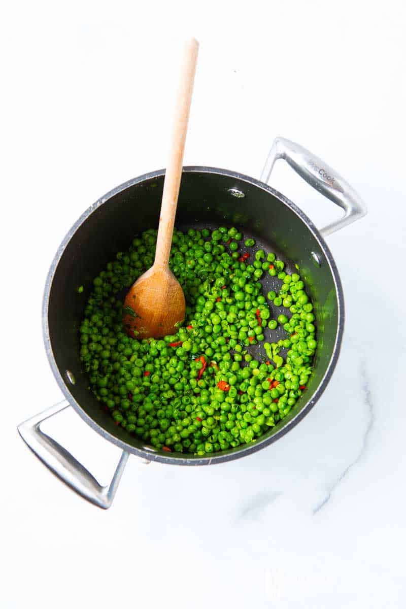 Peas simmering in a pot