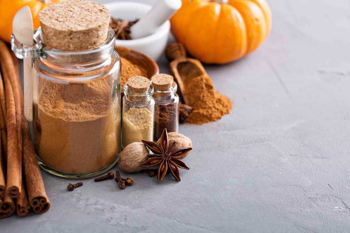 Glass jars of brown pumpkin powder.