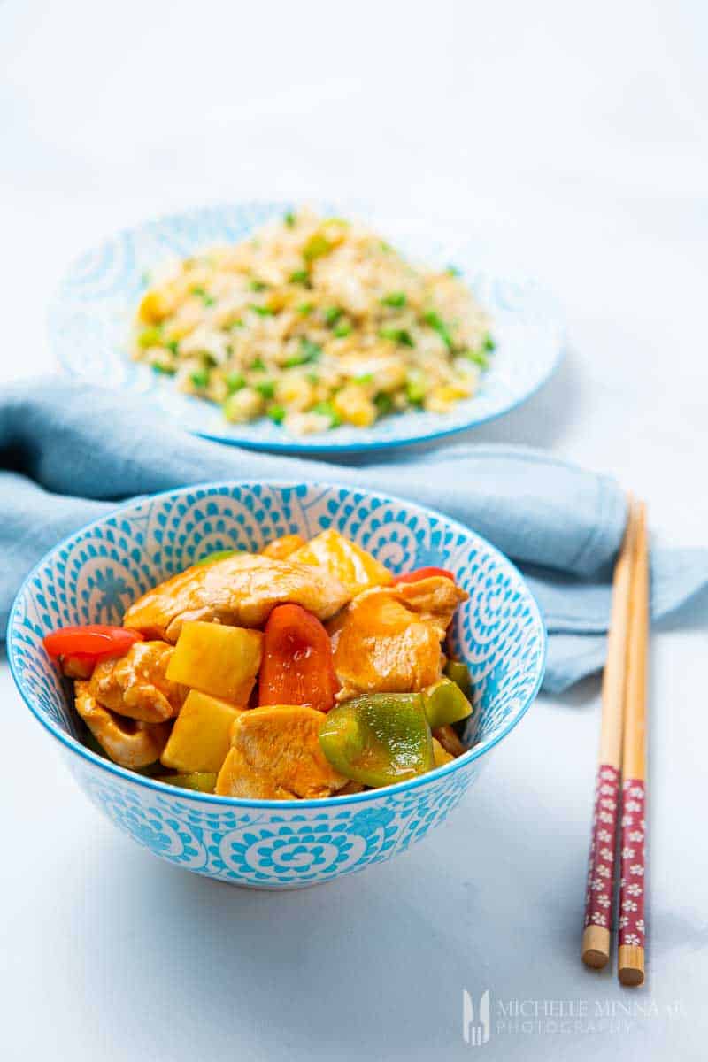 Bowl of fanta chicken, peppers and pineapple