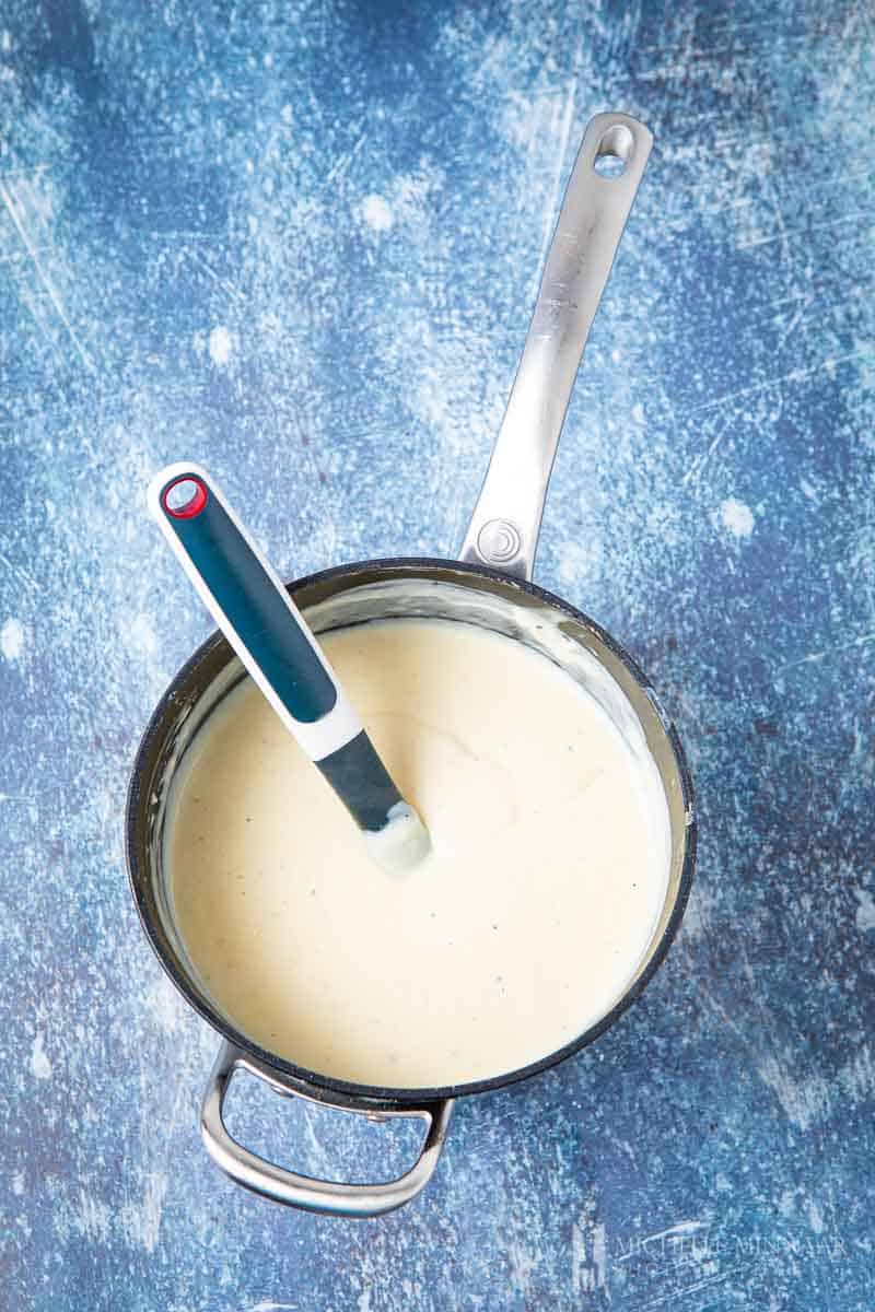 White cream in a saucepan