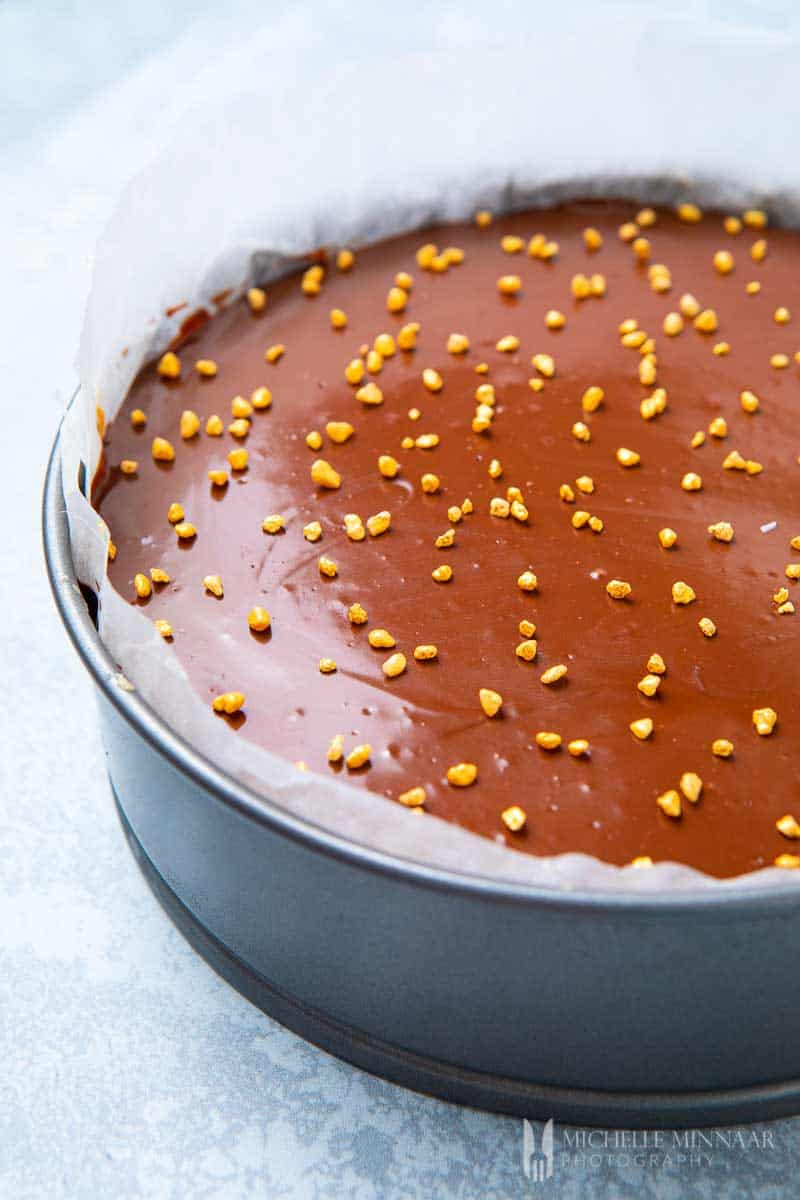 Decorated cheesecake before baking
