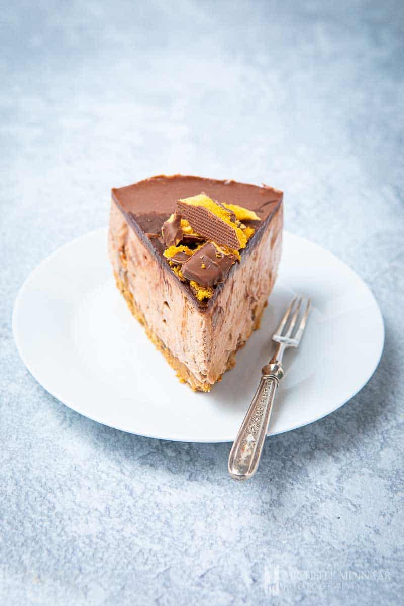 Slice of Crunchie cheesecake