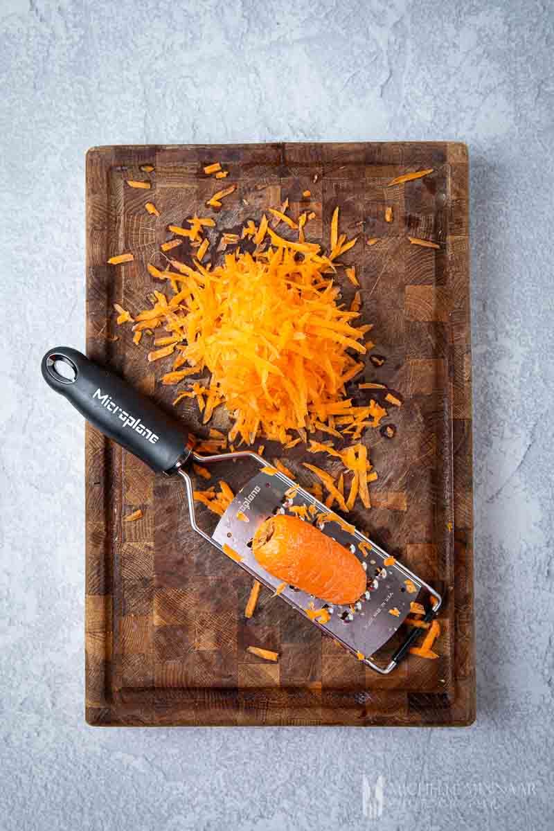 Shredded carrot and a zester