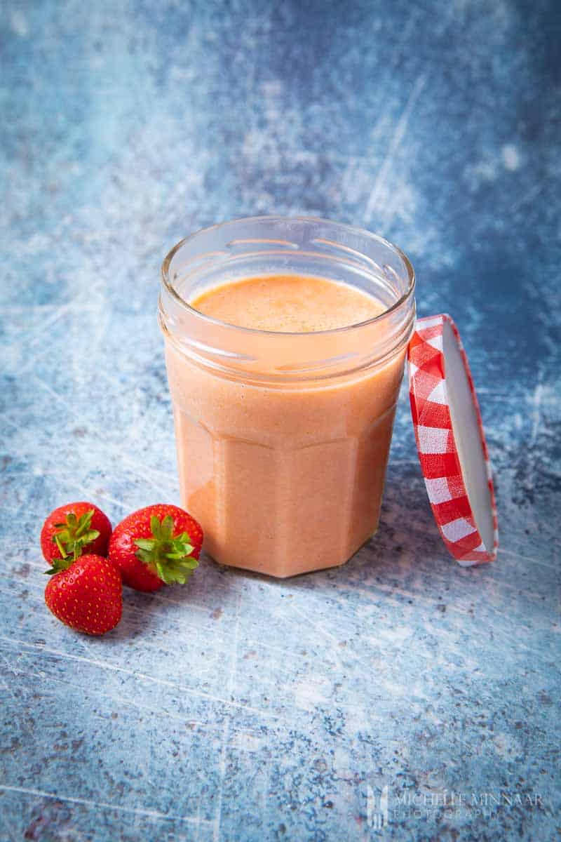 Clear Jar of strawberry curd