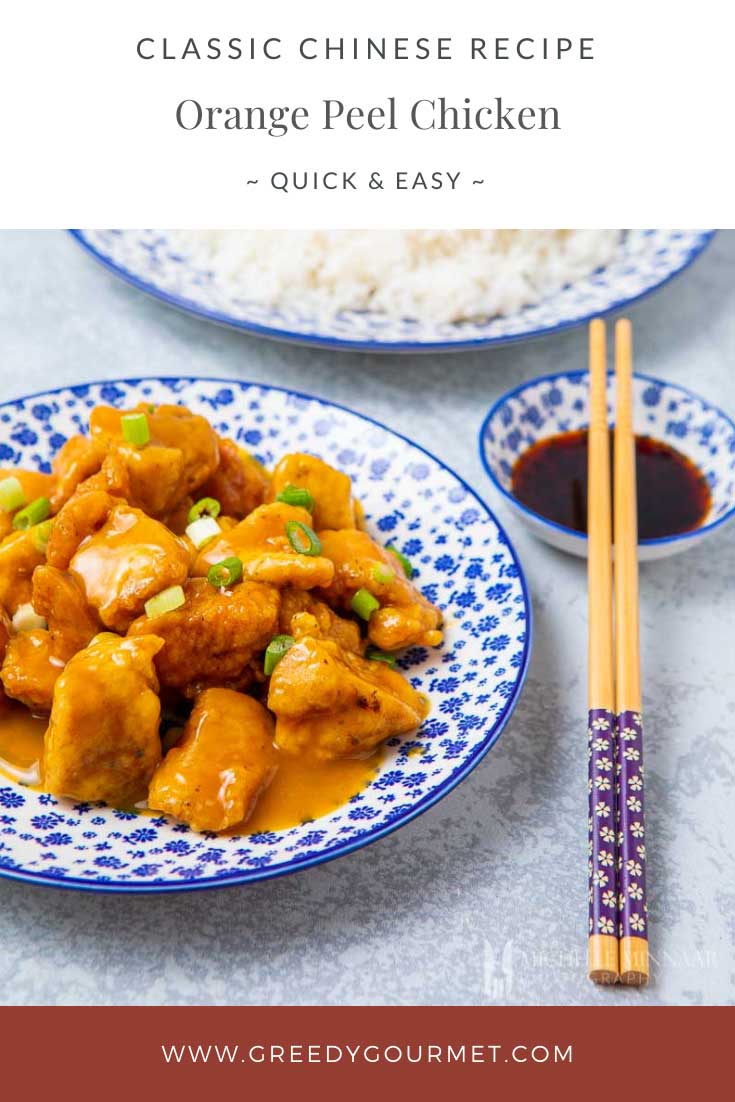 Plate of Orange peel chicken and chop sticks 