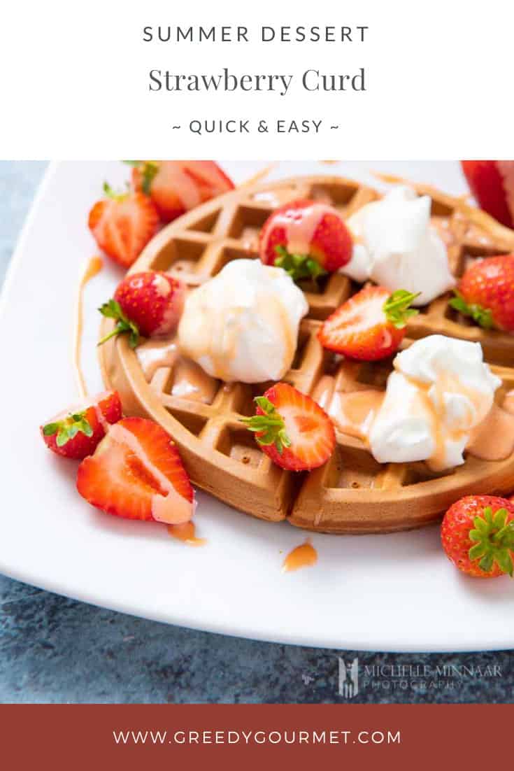 Waffle covered in strawberries and strawberry curd