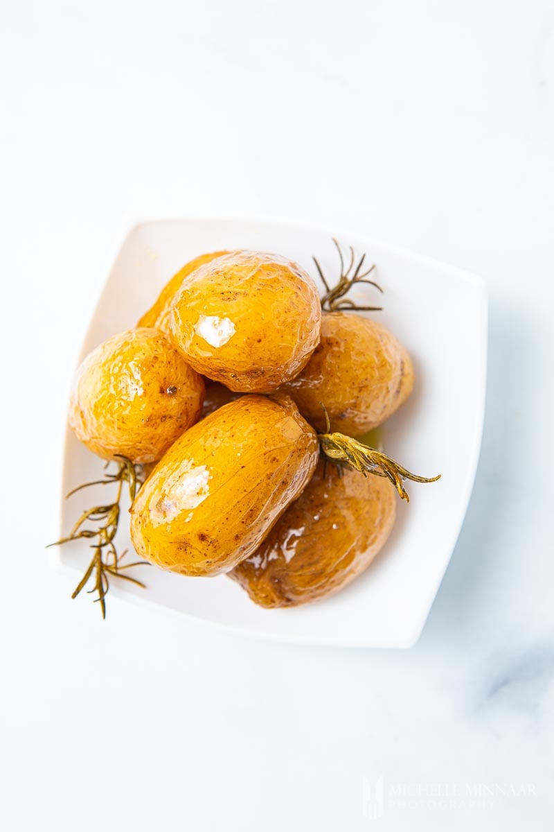 Plate of yellow confit potatoes