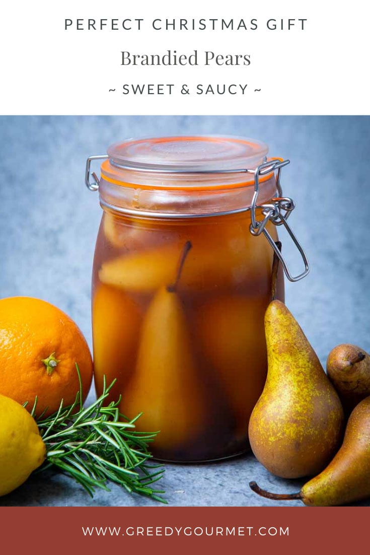 Clear jar of brandied pears