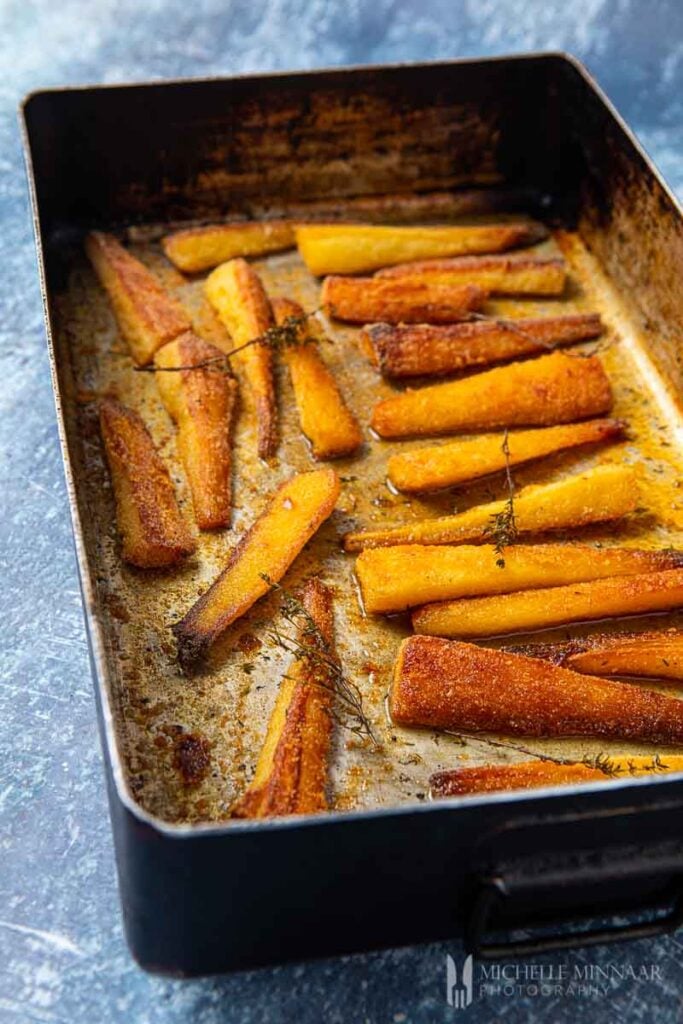 parmesan parsnips in a pan 