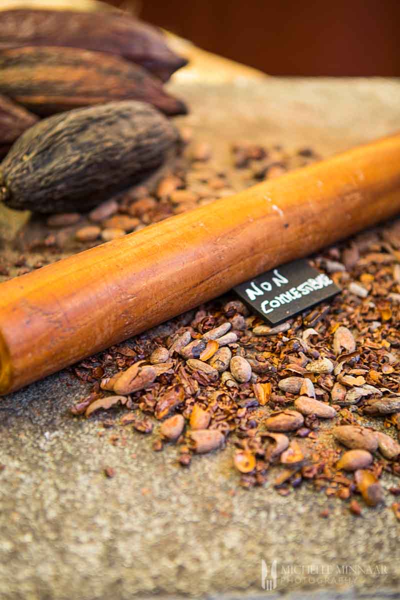 Toasted chocolate nibs that are crushed with rolling pin.