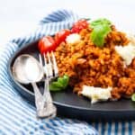 Plate of Beef Risotto and fork and spoon