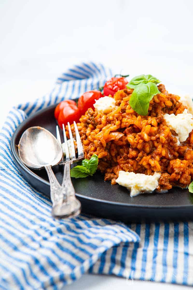 Plate of Beef Risotto and fork and spoon