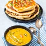 Bowl of Indian chutney with indian bread