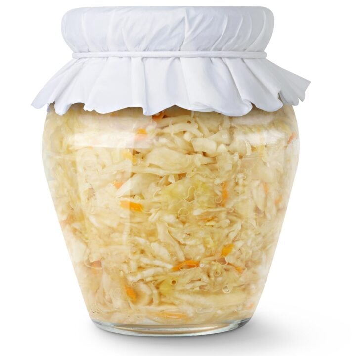 Glass sealed jar of pickled white cabbage