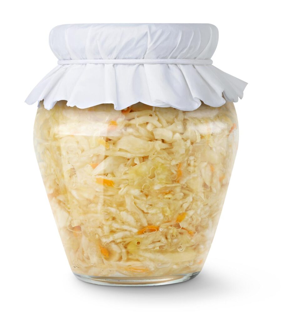 Glass sealed jar of pickled white cabbage