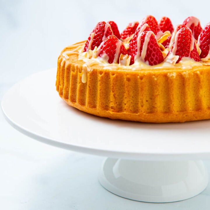 Whole side view of a strawberry flan cake