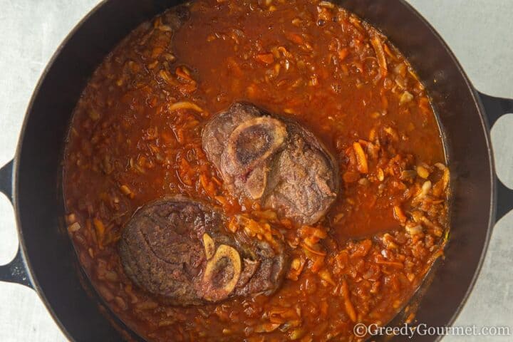 add browned meat to large cooking pot.