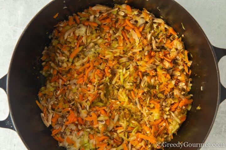 softening vegetables in a large pot.