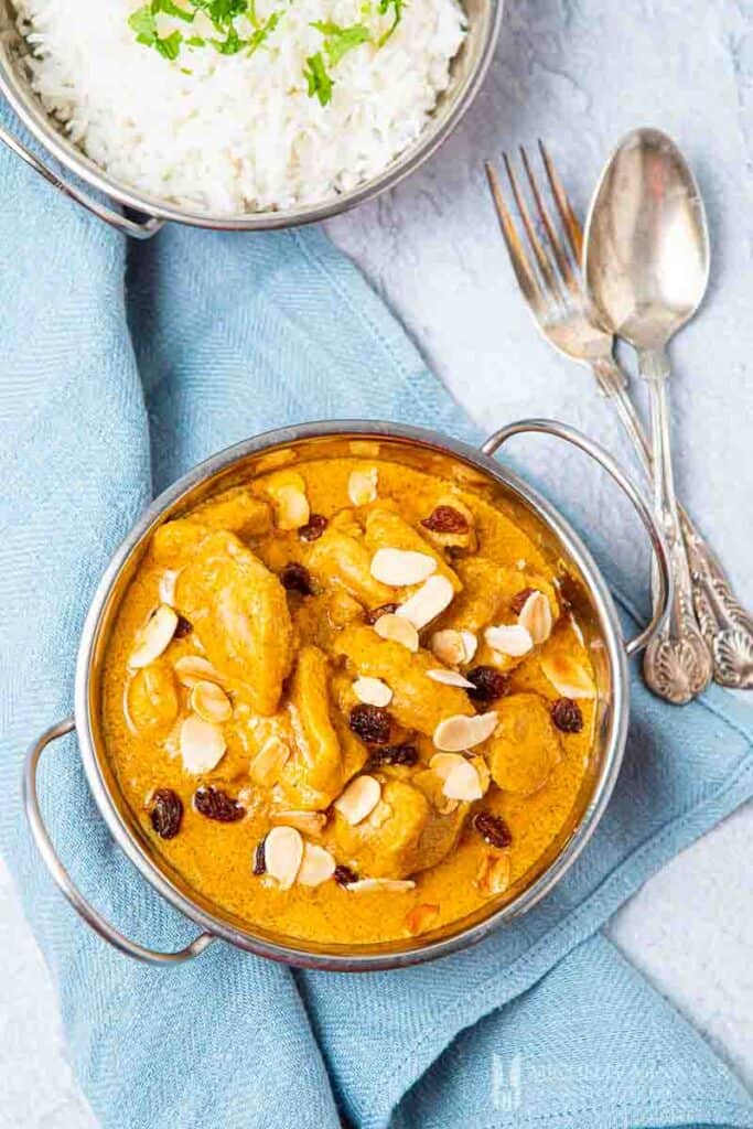 Curry chicken with almonds on top