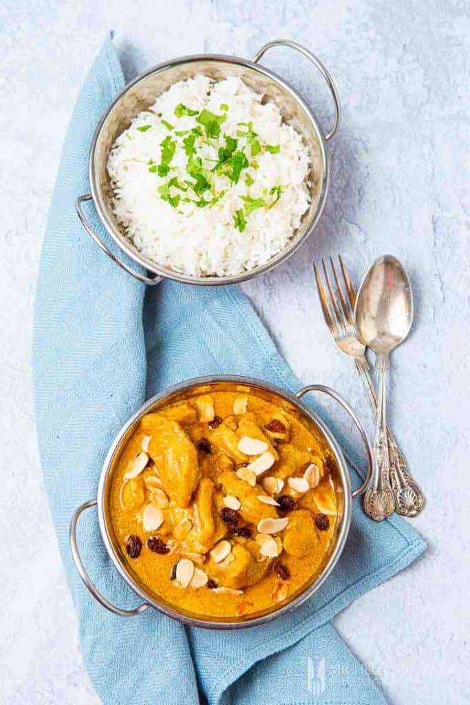 Bowl of chicken pasanda and white rice