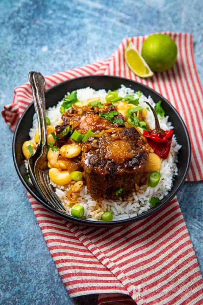 Full Carribean meal, oxtail over rice