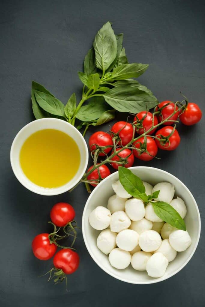 Small balls of fresh mozzarellla in a bowl to show you how you can freeze mozzarella cheese