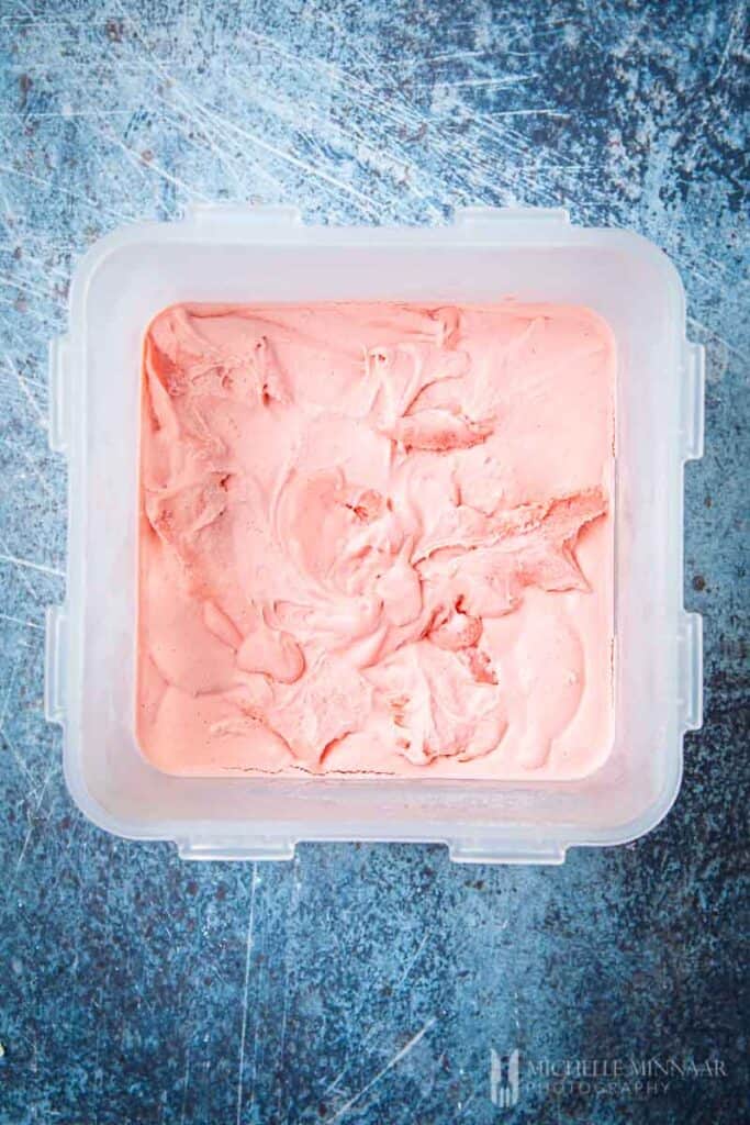 Pink Ice cream in a tub