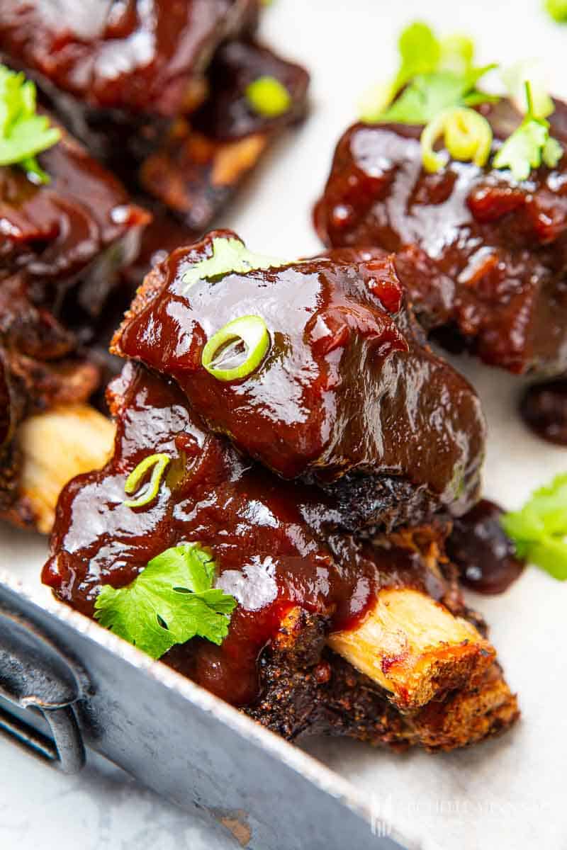 Finished smoked ribs with bbq sauce