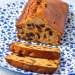 Loaf and slices of a brown baked weetabix cake