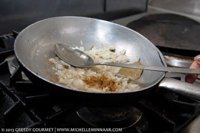 Spices being fried in a pan