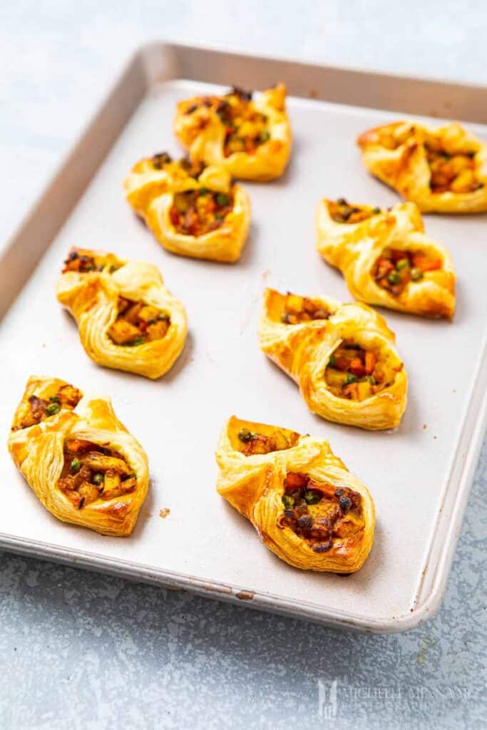 Veggie puffs on a baking pan