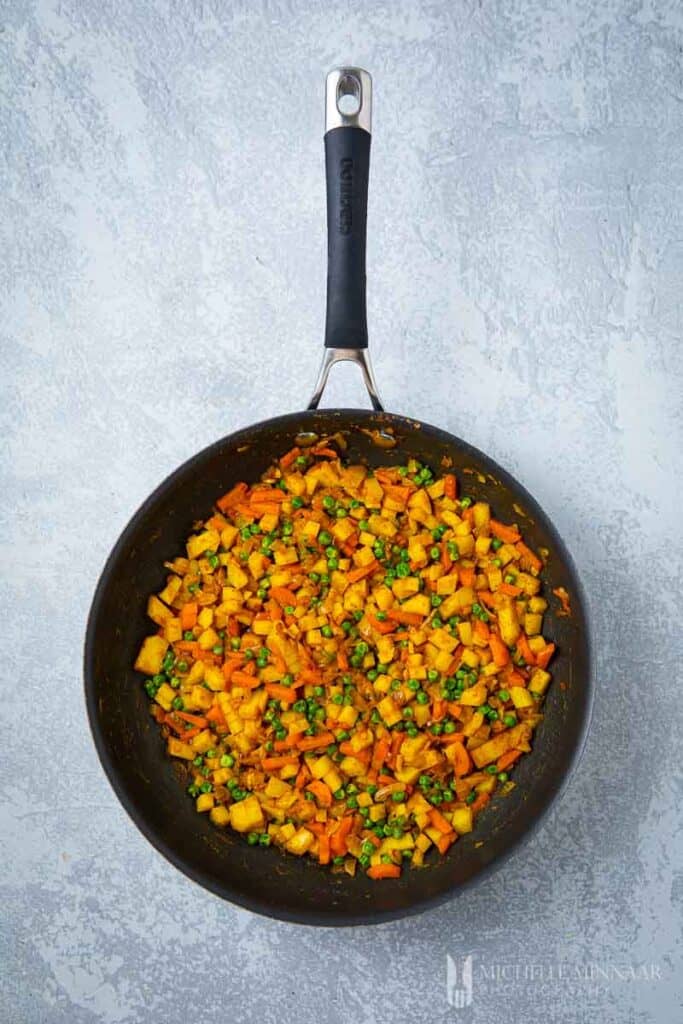 Vegetables simmering in a pan