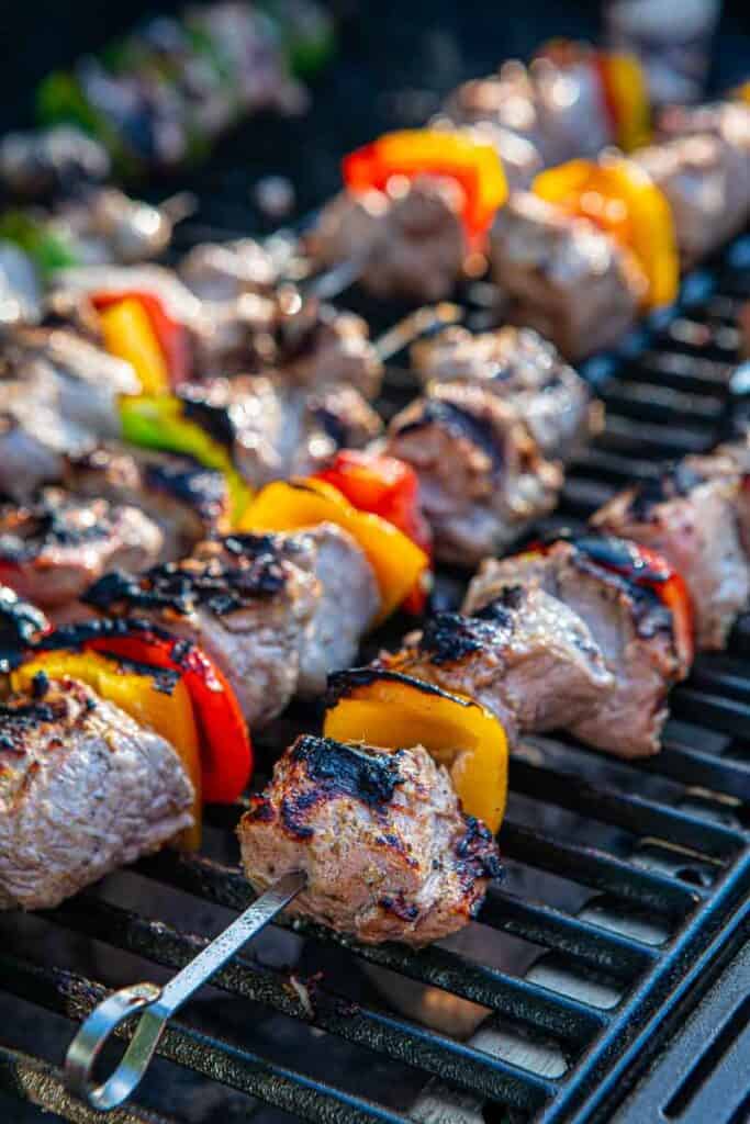 Grilling Marinated Shashlik On A Grill. Shashlik Is A Form Of Shish Kebab Popular In Eastern, Central Europe And Other Places. Shashlyk (meaning Skewered Meat) Was Originally Made Of Lamb. Royalty Free