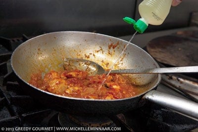 Vinegar squirting into a pan
