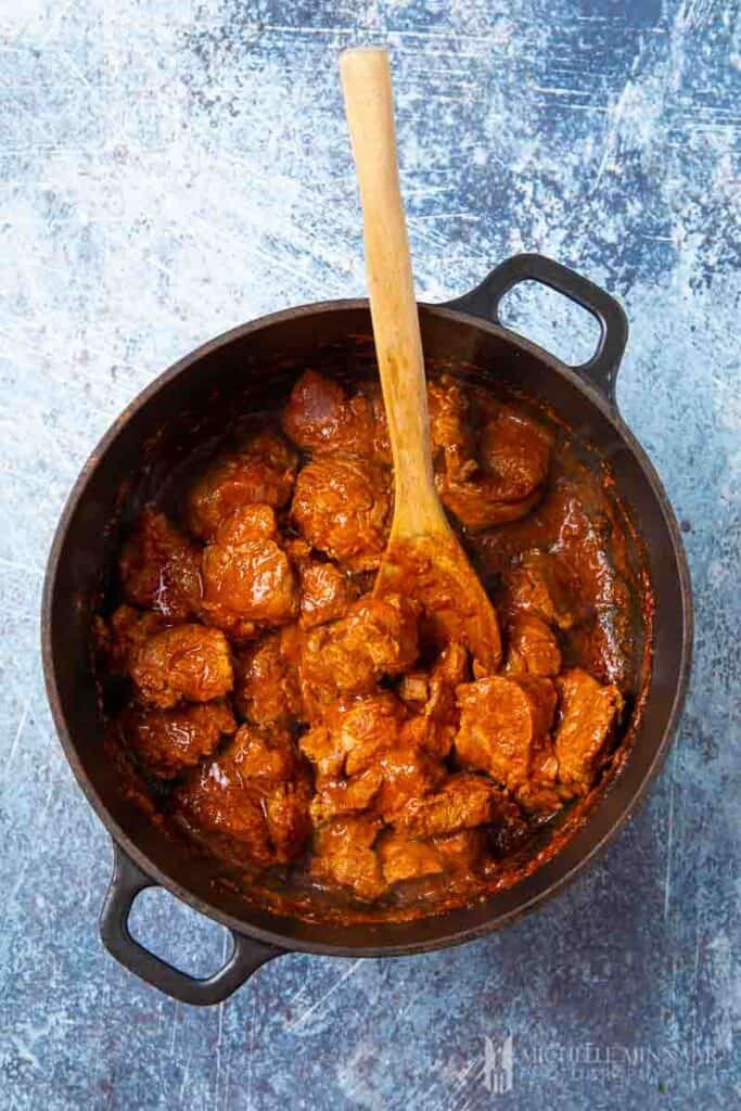 Lamb browning in a pot