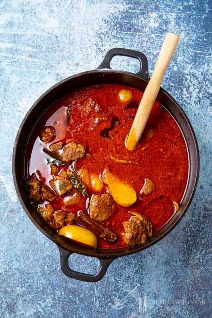 Lamb slow cooking in a pot