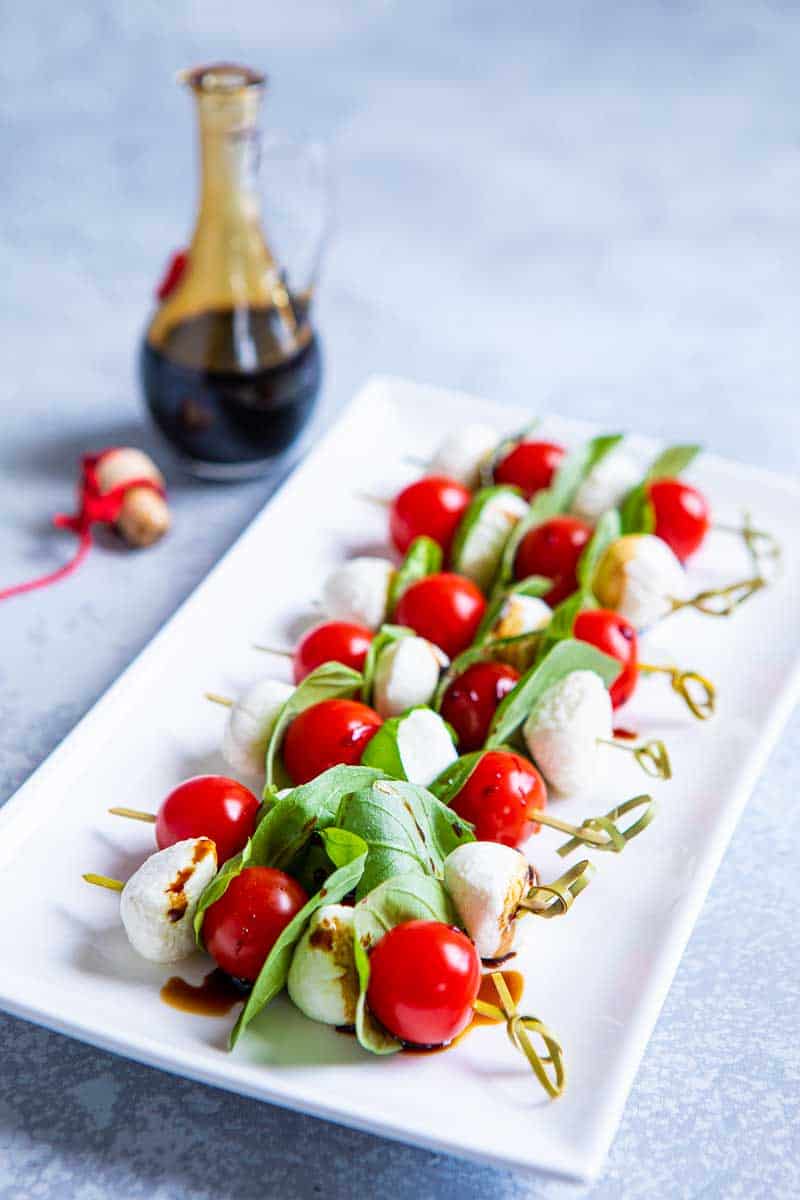 Plate full of caprese skewers recipe