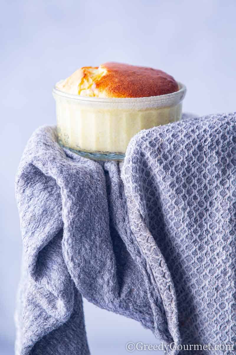 A perfect cheese souffle in a glass dish
