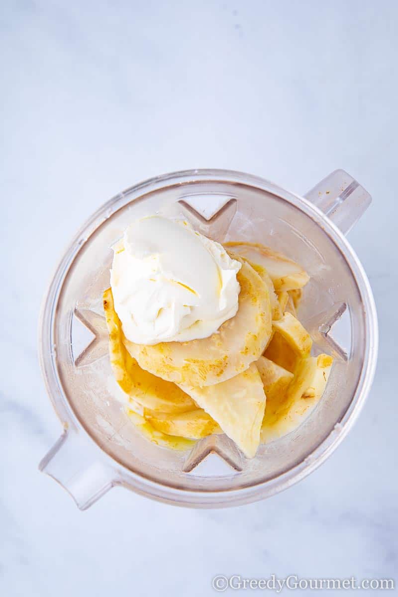 Ingredient in a blender to show you how to make celery root puree