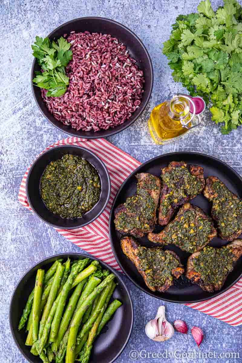 Plate of marinated lamb with side dishes