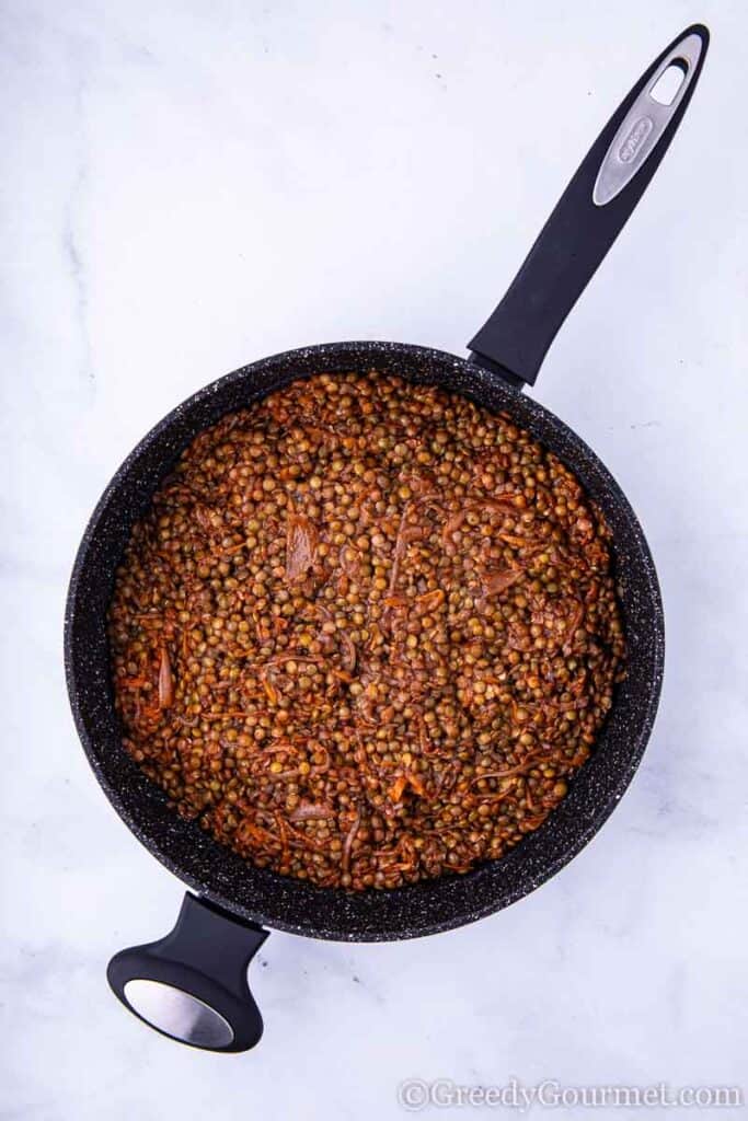 Lentils being cooked in a Zyliss pan