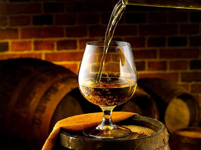 Cognac being poured into a glass