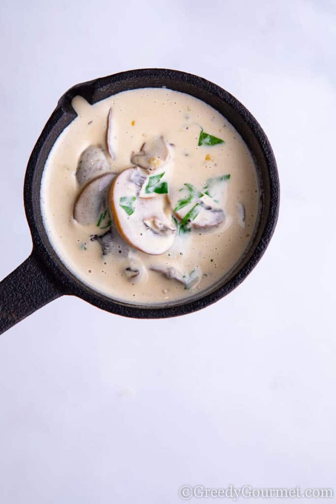 creamy mushroom sauce in pan